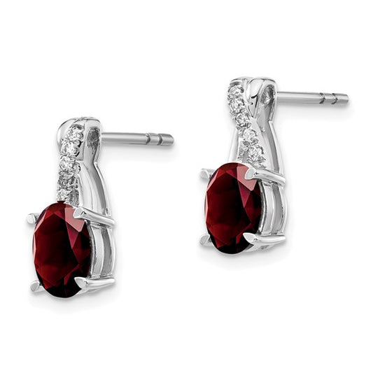 10K WG 7x5 Oval Garnet and Dia Earrings Rd 10 1.1mm dias - Stone:A Mel:S43