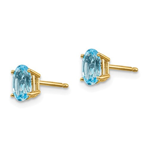 14k 6x4 Oval December/Blue Topaz Post Earrings