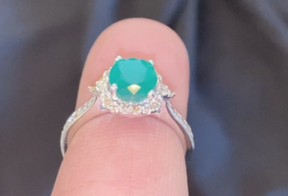 10K WHITE GOLD 2.25 CARAT DIAMOND & OVAL EMERALD RING